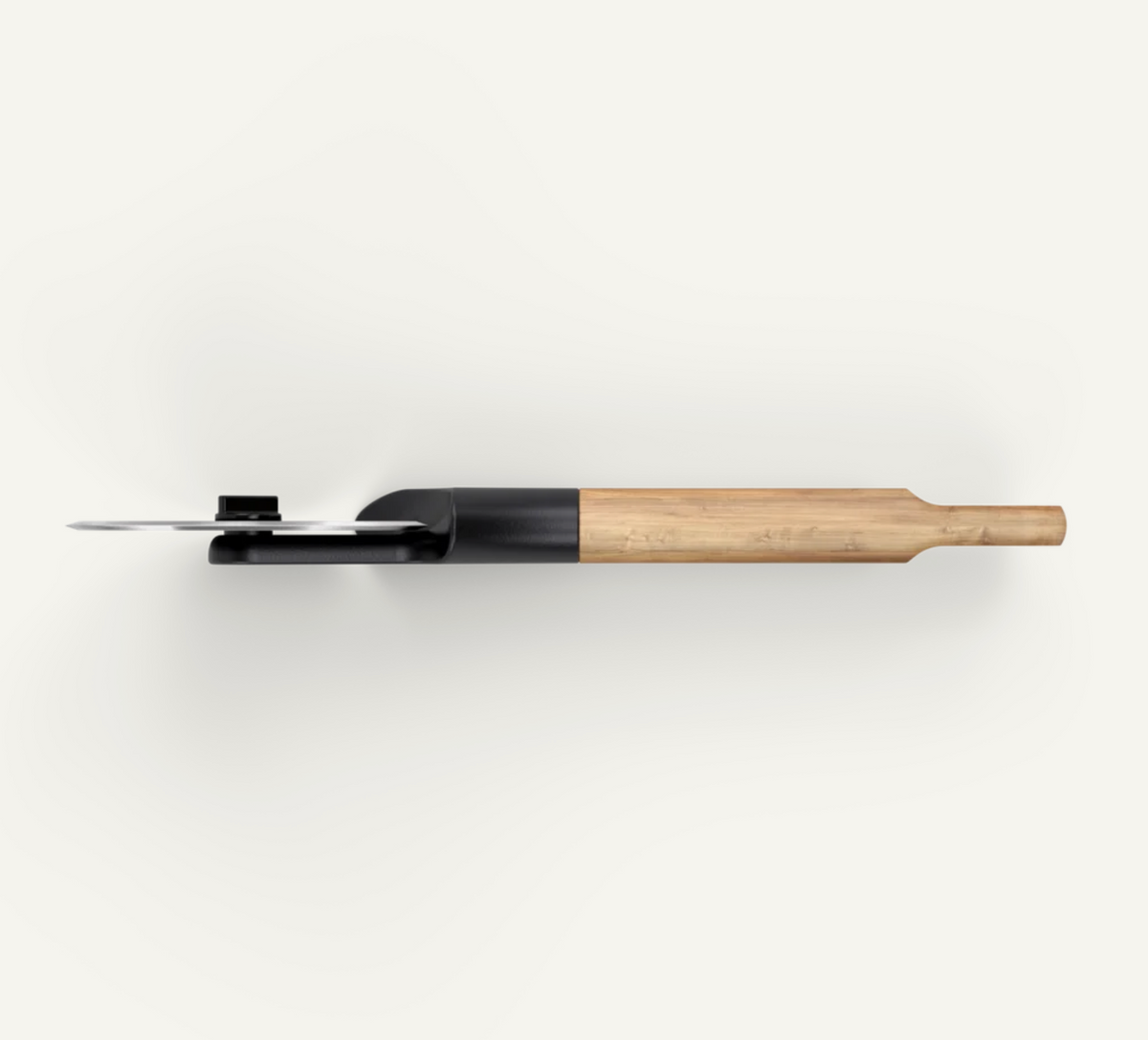 A modern kitchen knife with a black handle and a light natural wood bolster, shown from a top-down perspective on a clean off-white background.