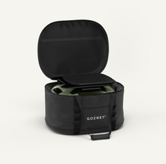 A black zippered carrying case with the brand name GOZNEY printed in white on the front, shown open with a padded lid and a dark green item inside, photographed on a clean off-white background.